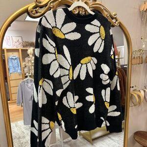 Cable knit black daisy sweater